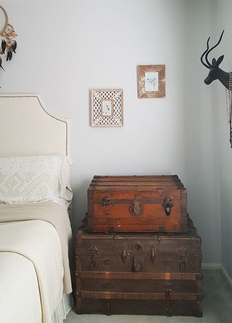 Using vintage steamer trunks as a nightstand allows for plenty of storage space...also how to remove that musty smell from vintage furniture! Tall Nightstand Ideas, Unique Nightstand Ideas, Nightstand Alternative, Tall Nightstand, Traditional Bedside Tables, Nightstand Ideas, Farmhouse Style Bedroom Decor, Modern Farmhouse Style Bedroom, Unique Nightstand