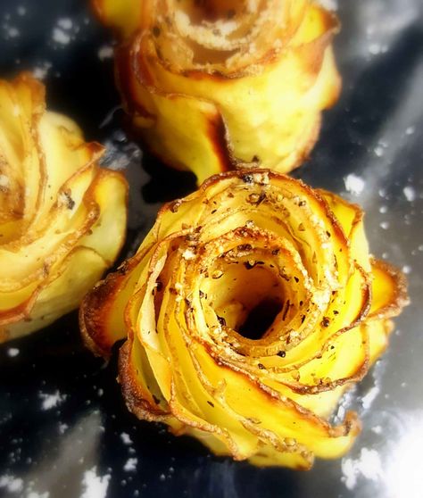 Whether mashed, baked or roasted, people often consider potatoes as a comfort food. Potatoes as a very good source of vitamin B6 and a good source of potassium, copper, vitamin C, manganese, phosphorus, niacin, dietary fiber, and pantothenic acid. Crispy Potato Roses are the most beautiful thing I have ever created using potatoes! Great edible blossoms adorning the plate. An interesting twist on boring baked potatoes. This is a beautiful appetiser to decorate your family dinner this weekend. ... Potato Roses, Food Potatoes, Bacon Roses, Seasoned Butter, Potatoes Recipes, Rose Recipes, Gourmet Dinner, Potato Sides, Potato Side Dishes