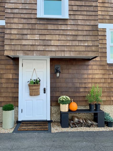 This is the exterior door to our basement...why not make it beautiful? Old houses have quirky areas, but that's what makes them interesting.#barnlightelectric Apple Crumble Gluten Free, Cedar Shake House, Vegan Apple Crumble, Small Lodge, Galvanized Planters, Fall Container Gardens, Vegan Apple, Fall Planters, Pumpkin Door