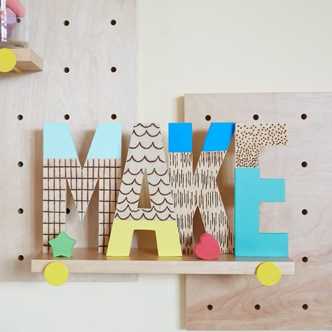 Wood-burned letters from The Land of Nod Wooden Letter Ideas, Raven's Home, Kids Art Space, Wooden Letters Decorated, Paint Dipping, Restoration Hardware Baby, Wooden Alphabet, Land Of Nod, Modern Furniture Stores