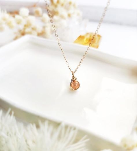 🌞 Delicate & Dainty Sunstone Necklace with 4mm Natural Sunstone and 14K Gold-filled, Rose Gold-filled, or Sterling Silver.• Pendant size: 1 cm✨ Sunstone is a wonderful lucky stone that brings light & healing energy of the sun. Wearing sunstone jewelry is believed to bring enjoyment & vitality to your life & the world around you. ✨• This necklace is carefully handmade for each order. It is tiny, lightweight, and super cute. Perfect for your basic everyday wear and will make a won Sunstone Necklace, Light Healing, Sunstone Jewelry, Lucky Stone, Layered Necklaces Silver, Healing Energy, Gold Filled Earrings, Wire Wrapped Earrings, Layering Necklace