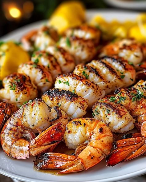 "WOULD YOU DIVE INTO THIS SIZZLING 🍤 Grilled Lobster and Shrimp 🦞? Savor the Freshness of the Sea! Quick to prepare, perfect for a busy lifestyle, and bound to impress at any family gathering. 🍽️ Ingredients 🍽️ - 4 tablespoons unsalted butter, melted - 1 teaspoon paprika - 1 tablespoon fresh parsley, chopped - 2 tablespoons fresh lemon juice - 4 cloves garlic, minced - 4 tablespoons olive oil - 1/2 teaspoon black pepper - 1 pound large shrimp, peeled and deveined - 2 lobster tails - 1/2 tea... Lemon Pepper Fish, Food Aversion, Lobster And Shrimp, Stadium Food, Brooklyn Food, Grilled Lobster Tail, Food Nyc, Sea Foods, Food Near Me