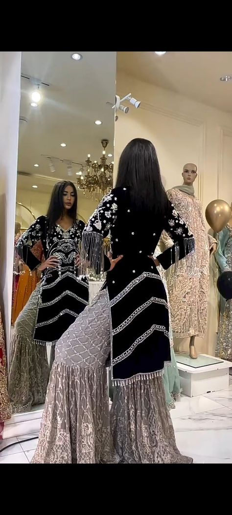 Beautiful Black Velvat shirt silver embroidery work wid silver sharara gota kanari use neck design.. Garara Dress Black And Golden, Black Velvet Sharara Suit, Black Garara Design, Black Garara Suit, White Velvet Suit, Silver Sharara, Velvet Garara, Black Garara, Velvet Sharara Suit