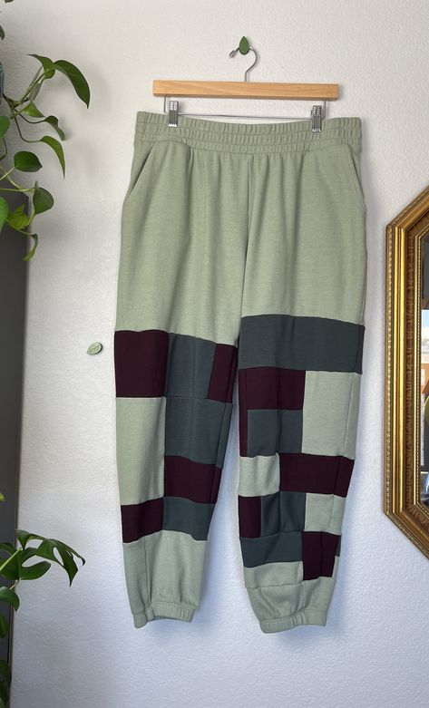 These unique upcycled sweatpants are now available at Jacquelyn Creates! Each pair is made from thrifted or donated materials. Available in sizes XS- 4XL for $75 a pair. Recycled Polyester Sports Bottoms, Short Length, Upcycled Tracksuit, Upcycled Sweatpants, Casual Cotton Patchwork Sweatpants, Mid-rise Recycled Denim Pants For Streetwear, Patchwork Sweatpants, Multimedia Art, Multimedia Arts, Grey Tones