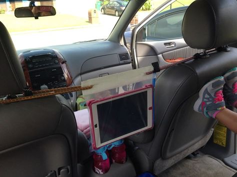 Ipad holder for car  Ziploc Bag, Duct Tape, Bungy Cords  Worked great on our road trip! Ipad Holder For Car, Ipad Holder, Kid Hacks, Road Trip With Kids, Dog Car Seats, Van Camping, Car Hacks, Family Road Trips, Road Trip Hacks