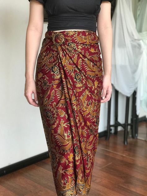 Maroon Bali Batik Instant Wrap Skirt HOW TO STYLE: This is instant wrap skirt, very easy to style.  You can wear this batik wrap skirt from day to night, as a beach cover up or style it with a top for a formal event. You can even turn this skirt into a beautiful dress.  Perfect for Bridesmaid Gift, Valentine's Day Gift, Mother's Day Gift, Birthday Gift for Her. MATERIALS: Cotton Batik with Bird Motif Batik was handcrafted by our local artisans Self Manufactured  Size inclusive❗️Contact us for cu Sarong Wrap Skirt, Batik Skirt, Bali Beach, Skirt Beach, Sarong Wrap, Sarong Skirt, Motif Batik, Festival Pants, Bird Motif