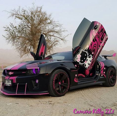 Hello Kitty Lamborghini, Camero Cars Aesthetic, Hello Kitty Car Wallpaper, Hello Kitty Tesla, Hello Kitty Car Wrap, Pink Hell Cat Car, Hello Kitty Hellcat, Pretty Cars For Women, Hello Kitty Race Car