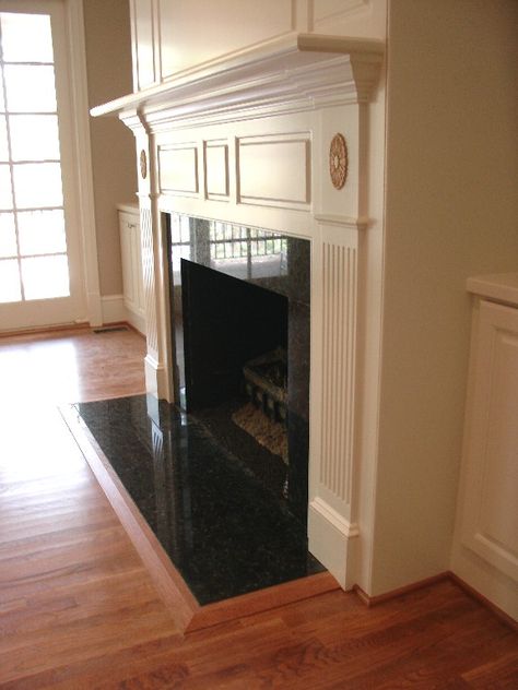 Granite fireplace surround Black Granite Fireplace, Granite Fireplace Surround, Granite Fireplace, Tall Fireplace, Cabin Fireplace, Slate Fireplace, Fireplace Bookshelves, Classic Fireplace, Paint Fireplace