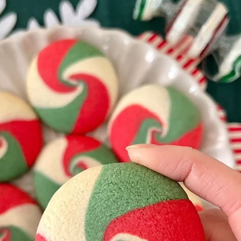 Alice Fevronia on Instagram: "💫 My neopolitan swirl cookie recipe has been my most popular recipe ever (according to hits on my website, and the number of times I’ve been tagged in your creations!) so I thought I would give them a festive makeover! 🎄 They’re made of a really simple buttery sugar cookie dough, but the joy is all in the swirl! I went for vanilla and almond this time, but you could add any flavourings you like, I guess even peppermint to make them taste like peppermint candy too! You will need (makes around 18 cookies): * 200g unsalted butter * 125g icing sugar * 1 large egg * Pinch of salt * 1 tbsp cornflour * 350g plain flour * 1 tsp vanilla extract * 1 tsp almond extract * Red, green and white food colouring  1. Cream together the butter and icing sugar 2. Add the eg Neopolitan Swirl Cookies, Red And Green Swirl Cookies, Red And White Christmas Cookies, Swirl Cookies Christmas, Swirl Cookies Recipe, Christmas Swirl Butter Cookies, Red And Green Cookies, Red And Green Christmas Cookies, Christmas Swirl Cookies