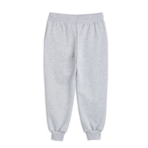 Grey melange sweatpants featuring a Ritzratz print, designed with ribbed cuffs, two pockets as well as an elastic drawstring waist. 100% Organic CottonUnisex DesignFinal Sale Item Baby Sweatpants, Sweatpants Grey, Grey Trousers, Grey Sweatpants, Mini Rodini, Clothes Collection, Favorite Person, Kids Accessories, Drawstring Waist