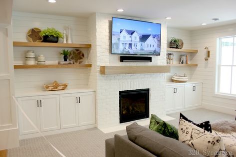 Painted interior white brick wall with a faux panel | 320 * Sycamore Fireplace Tv Unit, Fireplace Mount, Living Room Ideas With Tv, Mount Tv Stand, Room Ideas With Tv, Above Fireplace, White Brick Fireplace, Tv Over Fireplace, Brick Wall Paneling