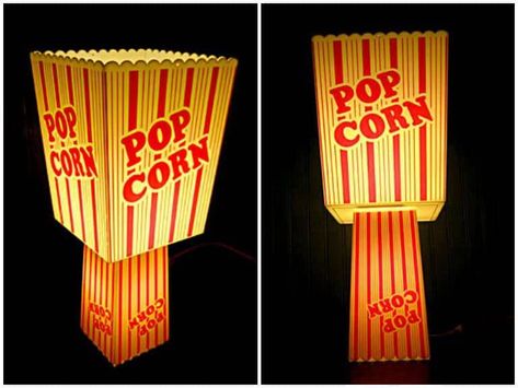 This table lamp has be made by re-using 2 popcorn containers (plastic ones). A cool lamp for your movie nights. There is a 15 watt bulb in the bottom part and a 9 watt CFL bulb in the upper part (in order to not burn the plastic). Via idlights.com For our French readers who like popcorn, we recommend …    Read More »  #Container, #Lights, #Recycled #LampsLights Cool Lamp, Popcorn Containers, Vintage Industrial Lighting, Vintage Light Fixtures, Cfl Bulbs, Cool Lamps, Outdoor Light Fixtures, Movie Room, Movie Nights