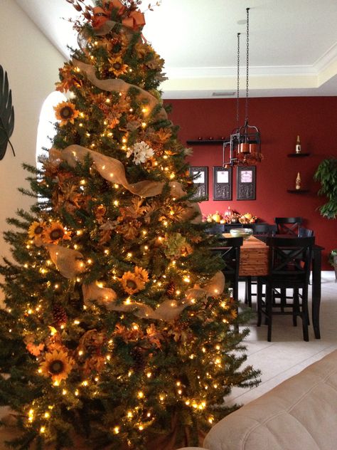 My "autumn Tree"...amber lights, fall leaf garland, sunflowers, hydrangeas, burlap ribbon. The evening glow of the amber lights creates such a warm & cozy atmosphere in our home. I love it! Fall Tree Decorations, Lights Fall, Fall Christmas Tree, Sunflower Tree, Thanksgiving Tree, Fall Leaf Garland, Autumn Tree, Amber Lights, Fall Thanksgiving Decor