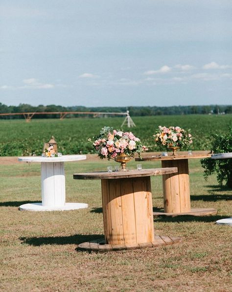 Barrel Tables Wedding, Wood Spool Tables Wedding, Wooden Cable Spools Ideas, Wire Spool Tables Wedding, Spool Table Ideas Wedding, Field Wedding Ideas, Spool Table Ideas, Rustic Outdoor Wedding Reception, Wire Spool Tables