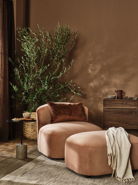 The Pantone 2025 Color of the Year Is Mocha Mousse | Architectural Digest Mocha Home Decor, Mocha Mouse Interior Design, Mocha Mousse Interior Design, Cream Colored Sofa, Interior Styles Guide, Plush Armchair, Mid Century Modern Farmhouse, Scent Candle, Scandinavian Mid Century Modern