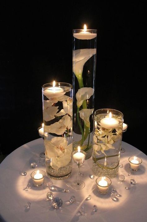 Diy Floating Candles, Floating Candle Centerpieces Diy, Wedding Candles Table, Candles Reception, Floating Candle Centerpieces, Elegant Wedding Centerpiece, Beautiful Wedding Reception, Wedding Reception Ideas, Wedding Reception Centerpieces