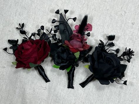 Pin on Boutonniere comes with 2 pins for your convenience 💕 Feel free to request different ribbon color or any customization including matching with a bouquet 🤗💕 We will be sending you photos for confirmation before shipping! 😍 Please check out our entire store for more awesome arrangements and bouquets!😇 We are a Full Service Florist 💐 That means that we can make and customize anything!💕 We make our bouquets and arrangements using highest quality silk and dried flowers!😇 You don't need to preserve them! They will stay with you forever as long as you keep them at the room temperature and don't expose them to the humidity 🌸 Please let us know your wedding date and ribbon color for your items, you can select burlap or twine instead of a ribbon as well 🤗 If you need your order in le Gothic Wedding Boutonniere, Goth Boutonniere, Whimsy Goth Wedding, Burgundy Boutonniere, Black Groomsmen, Black Rose Bouquet, Gothic Wedding Theme, Red Quinceanera Dresses, Maroon Wedding