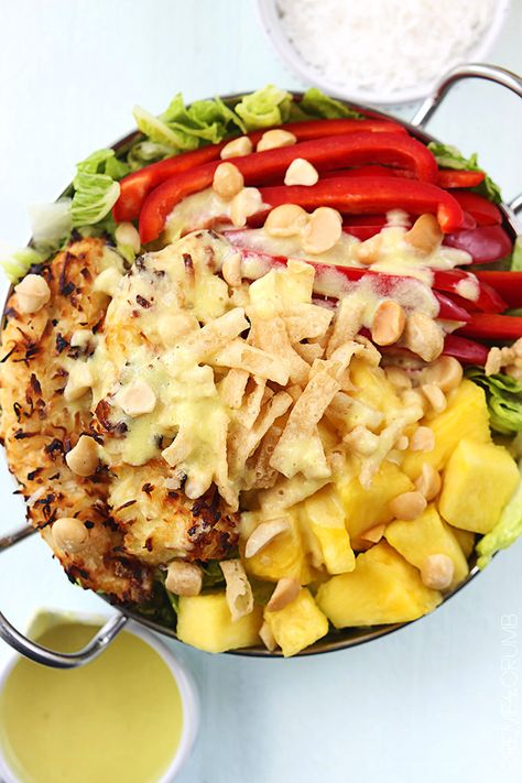 This sensational summer salad has baked coconut chicken tenders, fresh pineapple, macadamia nuts, and a creamy pina colada vinaigrette dressing! Creamy Pina Colada, Coconut Chicken Tenders, Baked Coconut, Salad With Chicken, Savory Salads, Salad Pasta, Coconut Chicken, Fresh Pineapple, Eat Salad