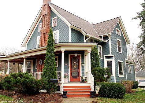 Suburban House Wrap Around Porch, Victorian With Wrap Around Porch, Blue House Wrap Around Porch, Aesthetic Wrap Around Porch, Brick House Wrap Around Porch, Victorian House Paint Exterior, Victorian Porch Decor, Half Wrap Around Porch, Vintage Homes Exterior