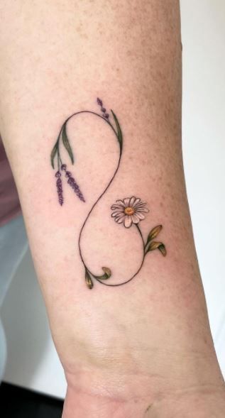 Stunning Infinity Tattoos, Designs, & Ideas - Tattoo Me Now Minimalist Tattoo Infinity, Intertwining Flower Tattoo, Infinite Sign Tattoo, Infinity Tattoo Unique, Infinity Tattoo Flowers Design, Infinity Shamrock Tattoo, Orchid Infinity Tattoo, Dandelion Infinity Tattoo, Infinity Tulip Tattoo