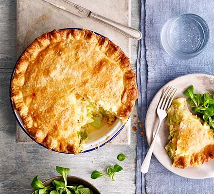 Cheesy leek & potato pie recipe | BBC Good Food Cheese And Potato Pie, Cheesy Leeks, Crawfish Pie, Leek Potato, Potato Pie Recipe, Leek Pie, Hp Sauce, Cheese Potato, Fresh Olives