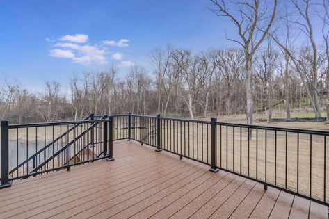 Hanson Builders Trex deck saddle color.  Black metal railing. outdoor living. Trex Saddle, Black Metal Railing, Railing Outdoor, Metal Railing, Lake Houses Exterior, Metal Deck, Deck Colors, Trex Deck, House Exteriors