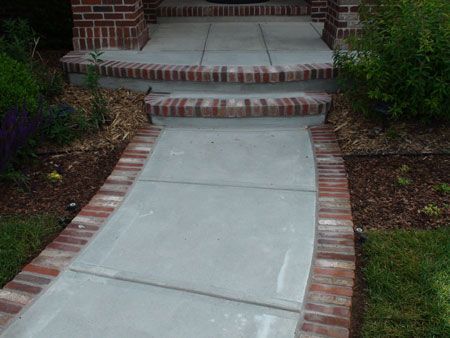 Brick And Concrete Front Porch, Cement Walkway, Front Porch Step, Brick Front Porch, Sidewalk Ideas, Stamped Concrete Walkway, Brick Sidewalk, Brick Border, Brick Porch