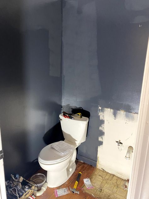 Our DIY Small Bathroom Makeover on a Budget - Full Hearted Home Navy Blue Small Bathroom Ideas, Small Blue Powder Room Ideas, Small Bath Paint Colors, Fun Half Bathroom Ideas Wallpaper, Half Bathroom Ideas On A Budget, Navy Blue Half Bathroom, Small Powder Bathroom Ideas Modern, Small Navy Blue Bathroom, Cheap Powder Room Makeover