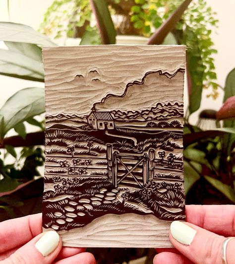 I have been immersed in large abstracted linocuts for a while now and have missed the simplicity of carving something spontaneous and done quickly in one sitting. So this was how my afternoon was spent at the work desk today. This was inspired by a fleeting moment from a recent road trip. And, as we zipped passed this little abandoned stone cottage, I snapped a picture and it stayed in my thoughts. I wondered what this cottage had seen over the years, it looked so lonely, the only thing sta... Multi Layer Linocut, Print Making Landscape, Wood Block Print Art, Print Carving Ideas, Linocut Border, Wood Cut Print, Wood Block Art, Linocut Art Ideas, Lino Art Ideas