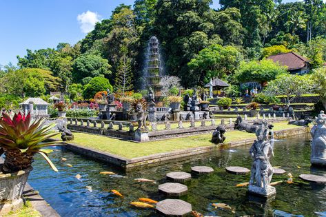 tirta gangga, Bali water palace, what to do in Bali, things to do in east bali, destination in east bali, where to feed fish in bali, koi fish bali, big lily pads bali, temples in bali, sights in bali, tourist destinations in bali Tirta Gangga Bali, Bali Temples, East Bali, Tirta Gangga, Bali Tourist, Koi Fishes, Adventure Bucket List, Deco Art, Travel Beauty