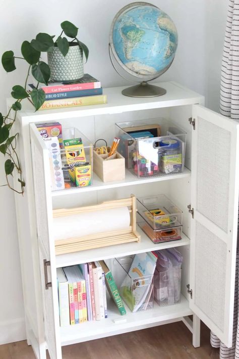 Ikea Homeschool Organization, Small Home School Space, Toy Cabinet Organization, Desk Cabinet Organization, Homeschool Storage Cabinet, Small Homeschool Space, Homeschool Organization Storage, Organize School Supplies At Home, Homeschool Cabinet