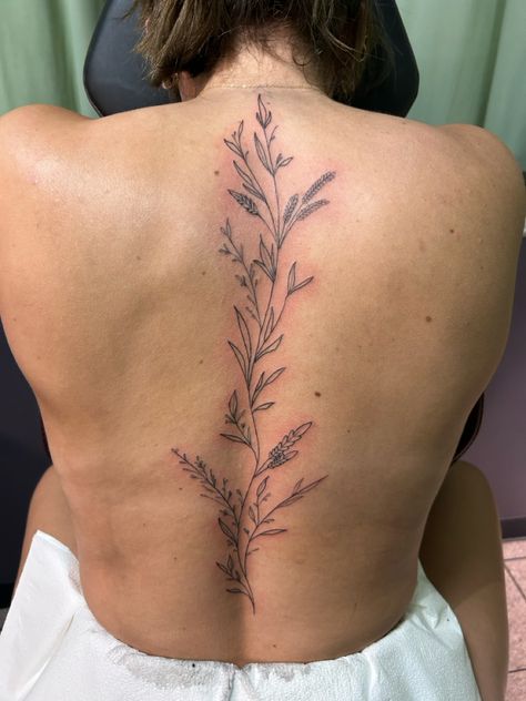 Roses Back Tattoo Women, Women Lower Back Tattoos, Linework Spine Tattoo, Tree Branch Spine Tattoo, Dragonfly Tattoo Spine, Flowers Down The Spine Tattoo, Hummingbird Spine Tattoo, Botanical Spine Tattoo, Delicate Spine Tattoo Flower