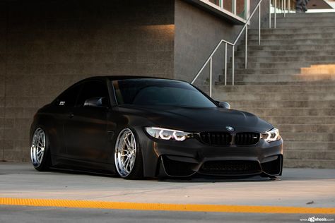 Stanced Blacked out BMW 4-Series Shod in Contrasting Chrome Rims Blacked Out Bmw, Bmw E30 Stance, Bmw M4 Coupe, Bmw 328i Coupe, Bmw M4 F82, Bmw Red, Black Bmw, Bmw M Series, F82 M4