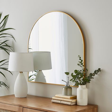 * Chic wall mirror * Timeless design * Easy to clean * Wall fixings not included Presenting our Essentials Arch Mirror, a timeless 70x70cm addition to your indoor space. Its elegant arch design effortlessly complements any decor style. Maintaining its pristine look is a breeze – just a quick wipe with a damp cloth, and it's good as new. Please note, wall fixings are not included, as they vary by wall type. But fear not, our Essentials Arch Mirror is equipped with sturdy D rings, ensuring easy ha Gold Arch Mirror, Dramatic Walls, Mirror Decor Living Room, Interior Design Tools, Hallway Mirror, Arched Mirror, Classic Interior Design, Arch Mirror, Cleaning Walls