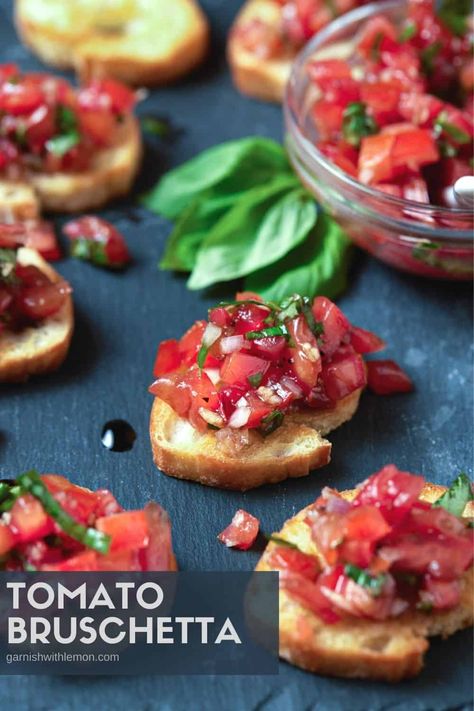 Calling all Tomato Bruschetta Lovers! Summer eating doesn't get any better than juicy tomatoes on toasted crostini with fresh basil and a balsamic glaze. This easy appetizer that comes together in less than 30 minutes will have everyone asking for the recipe! Bruschetta Recipe Balsamic, Italian Bruschetta Recipe, Antipasto Platter Italian, Classic Bruschetta, Easy Bruschetta Recipe, Italian Bruschetta, Italian Buffet, Toasted Crostini, Italian Antipasto