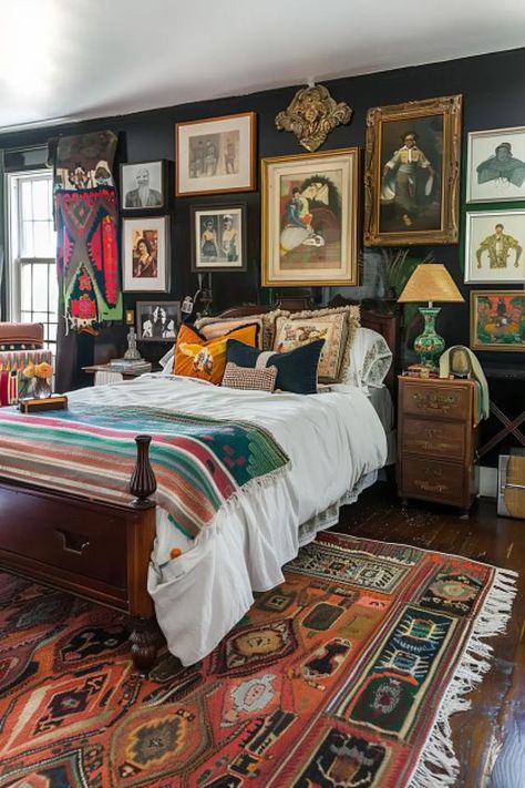 An eclectic art collection adds personality to your boho bedroom, channeling the creative spirit of the 1980s. Tap to see how to curate your own gallery wall! Cozy Eccentric Bedroom, Eclectic Maximalism Bedroom, Vintage Eclectic Bedroom, Eclectic Vintage Bedroom, Noir Decor, Colorful Eclectic Bedroom, Boho Style Bedroom Ideas, Treehouse Bedroom, Nyc Bedroom