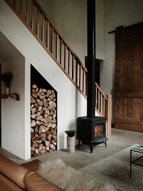 wood burning stove in front of the stairs  in the beautiful, nature inspired home of ceramicist Kelli Cain. Photo: Pia Ulin. Style Loft, Under Stairs, Decor Minimalist, Scandinavian Home, Wood Burning Stove, Wood Stove, A Fire, Inspired Homes, House Inspiration