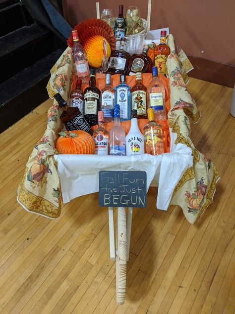 Booze Raffle Basket Ideas, Alcohol Raffle Basket, Booze Wagon Fundraiser, Wheelbarrow Of Booze Raffle, Barrel Of Booze Raffle Ideas, Liquor Fundraiser Basket Ideas, Auction Gift Basket Ideas, Wooden Wheelbarrow, Raffle Basket