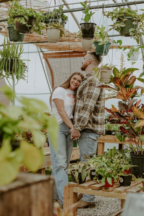 Greenhouse Pictures Family, Plant Nursery Photoshoot Couple, Plant Shop Engagement Photos, 40 Year Old Couple Photoshoot, Couples Greenhouse Photoshoot, Greenhouse Picture Ideas, Garden Center Photoshoot, Botanical Garden Photo Shoot Couple, Botanical Garden Family Photoshoot