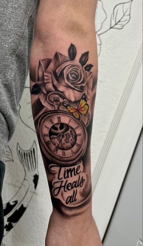 rose tattoo Memorial Clock Tattoos For Women, Memorial Clock Tattoos, Memorial Half Sleeve Tattoos, Big Forearm Tattoos For Women, Clock Tattoos For Women Half Sleeves, Time Heals Tattoo For Women, Men Realism Tattoo, Time Heals All Tattoo, Time Waits For No One Tattoo