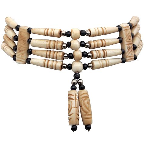 PRICES MAY VARY. Tribal Style Necklace - Add a tribal and sophisticated touch to your native American Indian inspired jewelry collection with this eye-catching buffalo bone hair pipe beads choker necklace. A Class Apart - Accented by 4 rows of black and tan hairpipe beads carved from buffalo bone, this tribal choker necklace will infuse your style with earthy elegance. Natural Product - The beads are made of real buffalo bones and are a natural product, so you may find some variation in color, s Indian Inspired Jewelry, Bone Choker, Necklaces Collection, Choker Necklace Online, Trendy Chokers, Women Choker Necklace, Choker Designs, Bone Jewelry, Womens Chokers