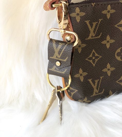 Louis Vuitton Upcycled /Repurposed  Mini Keychain Key Holder Handmade from Authentic Vintage LV Handbag Monogram Canvas LV Logo with Key Ring and Lobster Clasp This Mini  and Cute  Keychain is Handmade in the USA. This Piece is constructed with the Authentic Monogram Of Louis Vuitton Canvas. LV  Logo Pattern  By using the known quality of one of the most recognizable luxury brands in the world,we created this piece not only beautiful but also durable and Unique.  Comes with Key Ring and Lobster Louis Vuitton Purse Accessories, Lv Handbags Monogram, Louis Vuitton Keychain Aesthetic, Upcycled Lv, Lv Accessories, Lv Key Chains, Louis Vuitton Key Pouch With Keychain, Louis Vuitton Keychain Wallet, Louis Vuitton Coin Purse Keychain