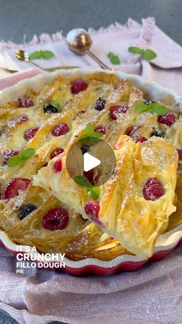 Vesela Asenova| Recipe Creator on Instagram: "Berry Soufra is a crunchy, buttery Phyllo dough pie baked with custard and berries and it simply melts in your mouth! 
Ingredients: 
10 oz phyllo dough 
7 tbs salted butter, melted 
6 oz berries of choice 
Powder sugar, for dusting
Mint leaves, for garnish 

Custard 
3 eggs 
1/2 cup sugar
1 cup milk 
1/2 cup heavy whipping cream 
1 tsp vanilla bean paste/extract 

Method: 
1. Preheat oven at 400 F; 
2. Brush melted butter on your baking/pie pan; brush butter in the first phyllo sheet and place it on the pan; butter the next phyllo sheet, crinkle it and place it on the pan; repeat for all phyllo sheets; brush remaining butter on top and bake for about 10-12 minutes or until golden; 
3. Beat egg with sugar, vanilla, milk and cream and pour over; Phyllo Dough Pie, Phyllo Cake, Phyllo Recipes, Baking Pie, Cinnamon Roll Recipe Homemade, Vanilla Bean Paste, Veal Recipes, Puff Pastry Desserts, Powder Sugar