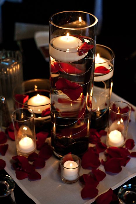 not sure if you would like this idea...but it could be a good idea for centerpieces without bouquets of flowers.... Seems simple, easy, and inexpensive! Obviously with some blush pink petals instead of red! Just a thought! :) Valentine Surprise, Diy Floating Candles, Purple Table, Wine Dinner, Picnic Ideas, Flowers Purple, Wedding Suite, Red Candles, Wedding Table Decorations