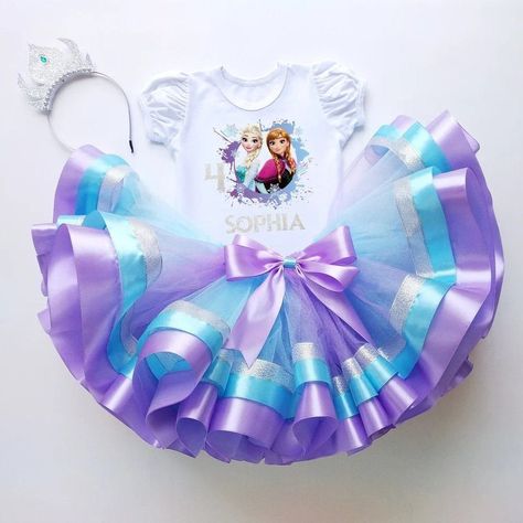 Your birthday girl will look adorable wearing her Frozen themed t-shirt, headband and tutu set. This birthday outfit comes in a wide range of sizes from toddlers to older girls in your choice of short or long bodysuit sleeves. Purple Toddler Dress, Frozen Birthday Party Decorations, Elsa Tutu, Make Outfits, Frozen Outfits, Elsa Birthday, Bombshell Dress, Toddler Parties, Outfit Birthday