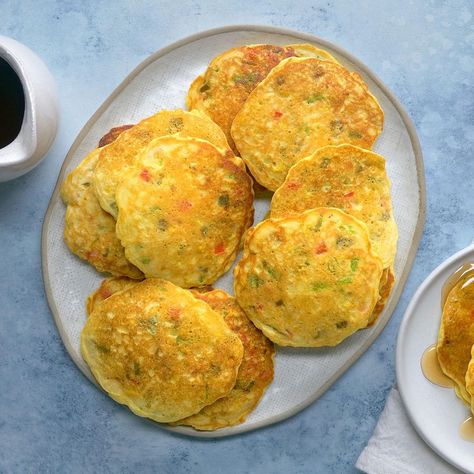 Corn cakes create the perfect breakfast with sausage and orange juice. Or, serve them as a side with your next barbecue feast. Breakfast With Sausage, Buttery Corn, Corn Pancakes, Cast Iron Skillet Cooking, Griddle Cakes, Sunday Football, Fresh Fruit Salad, Skillet Cooking, Corn Cakes