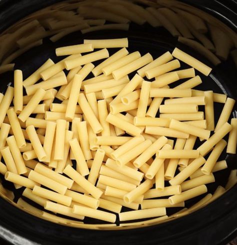 Throw raw pasta into a slow cooker and then watch your family devour this classic Slow Cooker Noodles, How To Cook Noodles In Crockpot, Italian Crock Pot Recipes, Pasta Bake In Crockpot, Crockpot Buttered Noodles, Pasta In A Crock Pot, Cook Pasta In Crockpot, Crock Pot Pasta Recipes Easy, Pasta In The Slow Cooker