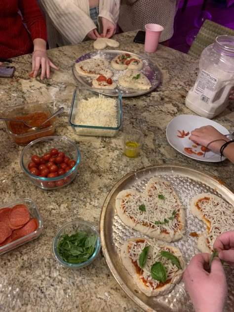 girls having fun making heart pizzas for valentine’s day Diy Pizza Night Party, Girls Pizza Night Aesthetic, Pizza Night Birthday Party, Wholesome Girls Night, Girls Night In Party Ideas Aesthetic, Galentines Pizza Party, Galintines Girls Night, Girls Night Inspo At Home, Girls Night Ideas Aesthetic