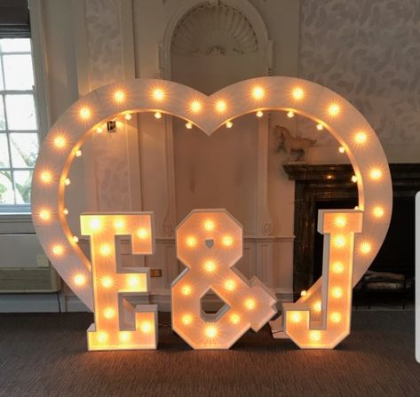 We are so in LOVE with our 8ft Light Up Love Heart .. !  It's a perfect addition to your special day and can be teamed with our 4ft letters for that extra special effect... Hire starts from £400 for the day .. What a spectacular feature at the end of the aisle, entrance to your reception or selfie area ..! . . #love #wedding #weddingplanning #weddingidea #weddingideas #heart #inspiration #romantic #specialday #lovewins #loveislove #bride #bridetobe #groom #groomtobe #mrandmrs #mrandmr #mrsandmrs Big Light Up Letters Wedding, Love Marquee Letters, Large Light Up Letters, Mr And Mrs Light Up Letters, Light Up Marquee Letters, Name Balloons, Mr And Mrs Led Sign, Mr & Mrs Light Up Letters, Heart Inspiration