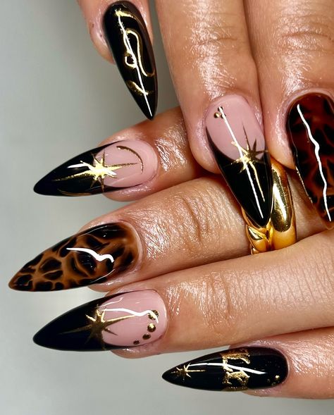 ♌️♌️♌️ . . @apresnailofficial Sculpted medium stiletto @nailzkatkat 024 @vbeautypure 050 @gelbabyla Bottomless Mimocha @lizzys_nail_art Matte top coat Blooming gel “PBP10” for $$ off! . . #nails #nailart #nailinspo #naildesign #handdrawn #miami #miamigardens #miamilakes #hialeah #wynwood #doral #miramar #pembroke #nailtech #nailartist #gelx #gelextensions #apres #naturalnails #overlay #structuredmani #watchmework #beforeandafter #nailsofinstagram #leo #chrome #cheetah #zodiac #305 Black And Gold Nail Designs, Luv Nails, Black Gold Nails, Medium Stiletto, Blooming Gel, Cow Nails, Gold Nail Designs, Matte Top Coat, Long Nail Designs